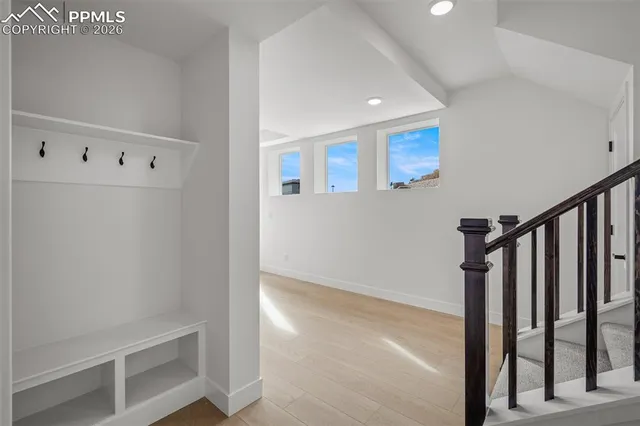 a view of a hallway with staircase