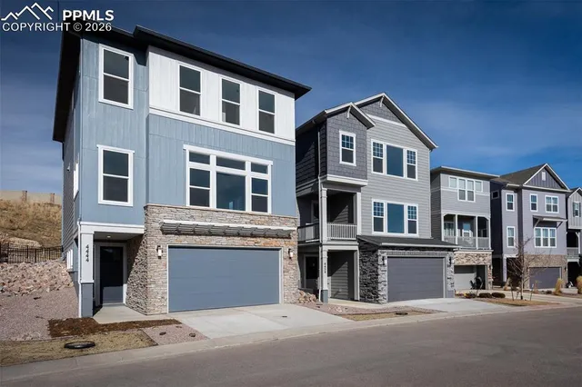 a backyard of a house with seating space