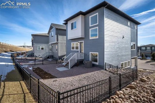 a view of a terrace with chairs