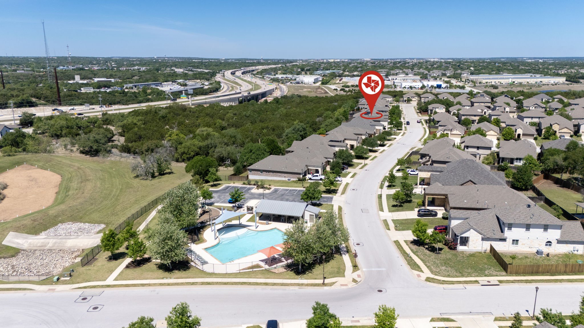 11412 Reading Way Austin, TX 78717 - Photo 2 of 35 an aerial view of residential houses with outdoor space and trees