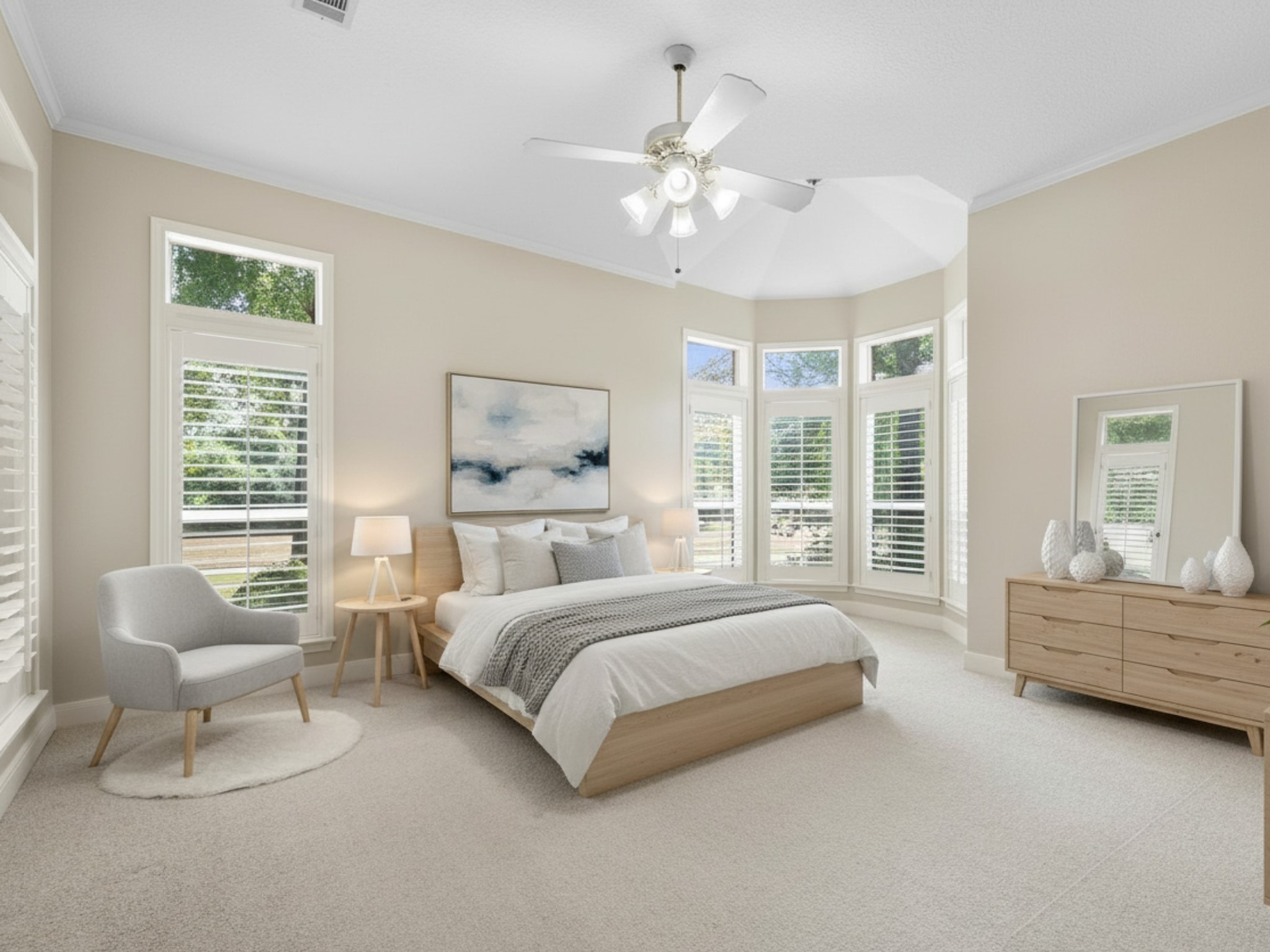 7 Wellesley Drive Conroe, TX 77304 - Photo 11 of 34 a spacious bedroom with a bed and a large window
