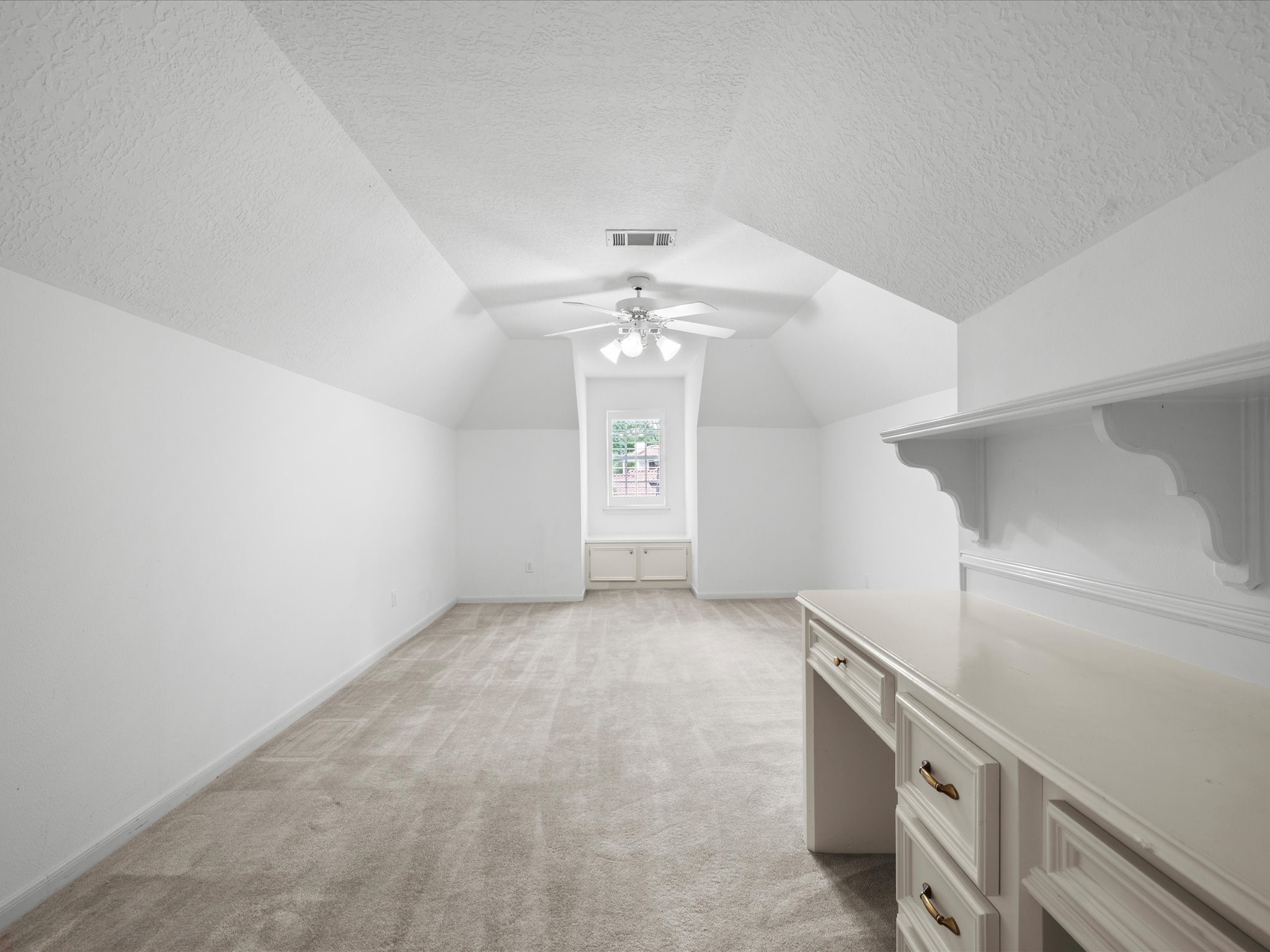 7 Wellesley Drive Conroe, TX 77304 - Photo 22 of 34 a view of an empty room with window