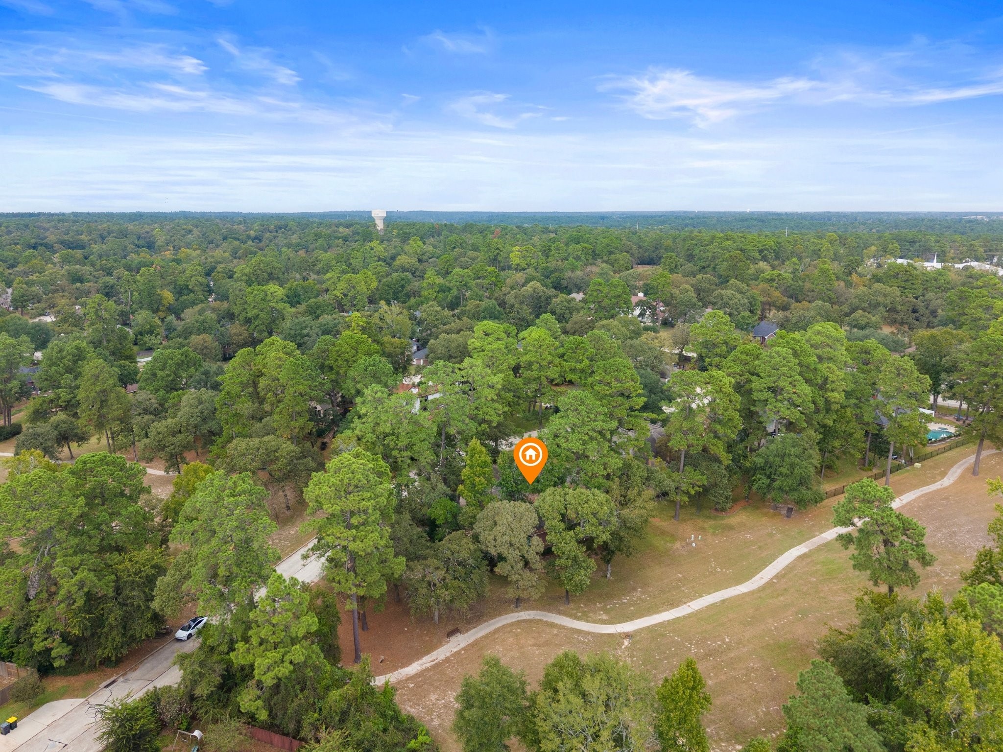 7 Wellesley Drive Conroe, TX 77304 - Photo 27 of 34 an aerial view of city
