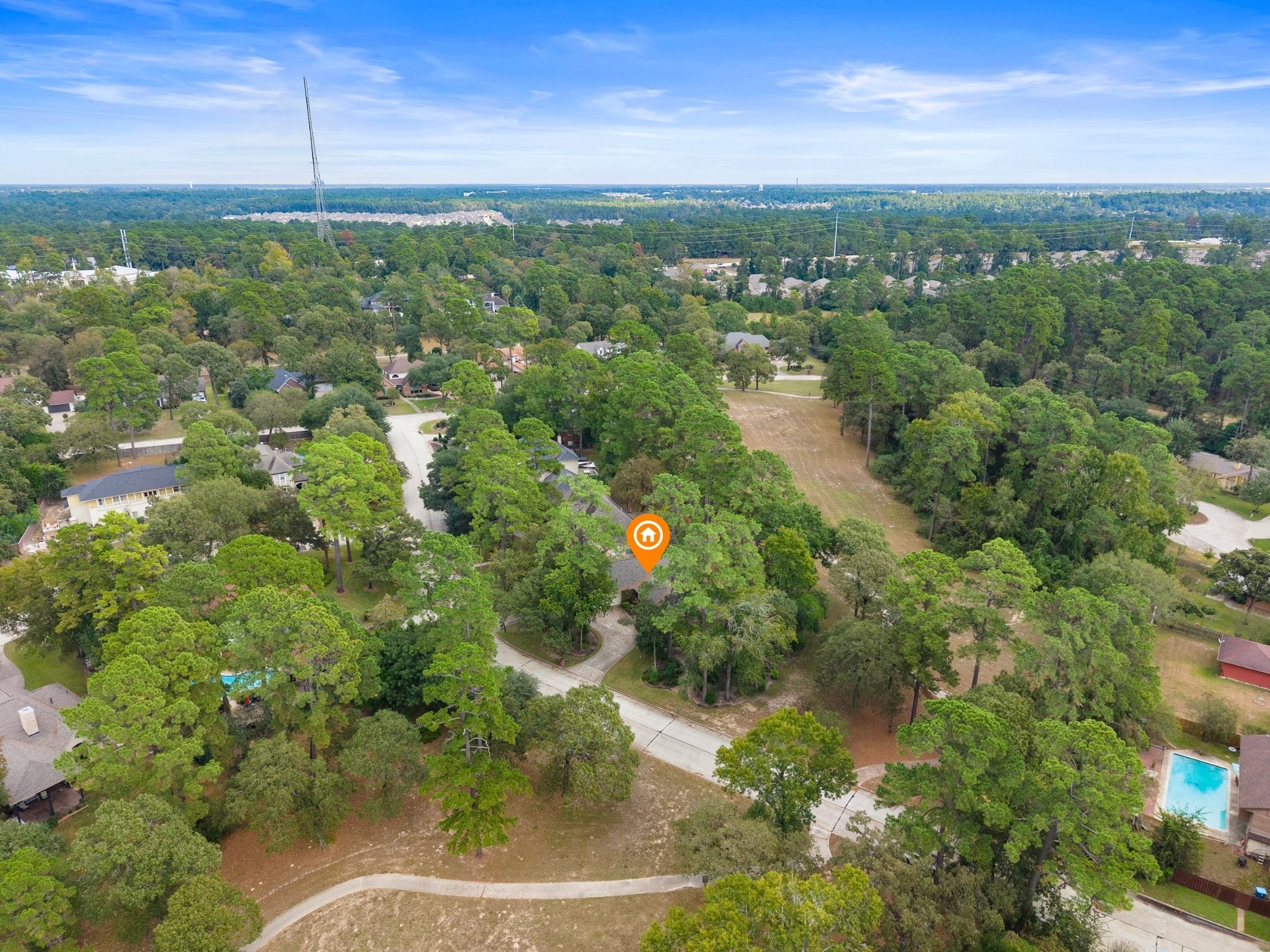 7 Wellesley Drive Conroe, TX 77304 - Photo 28 of 34 a view of a city
