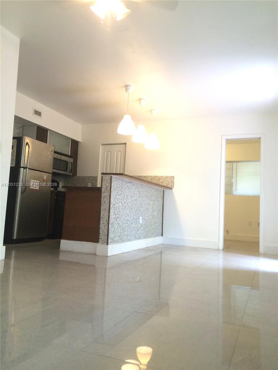 7025 Rue Granville, Unit 1 Miami Beach, FL 33141 - Photo 2 of 10 open kitchen