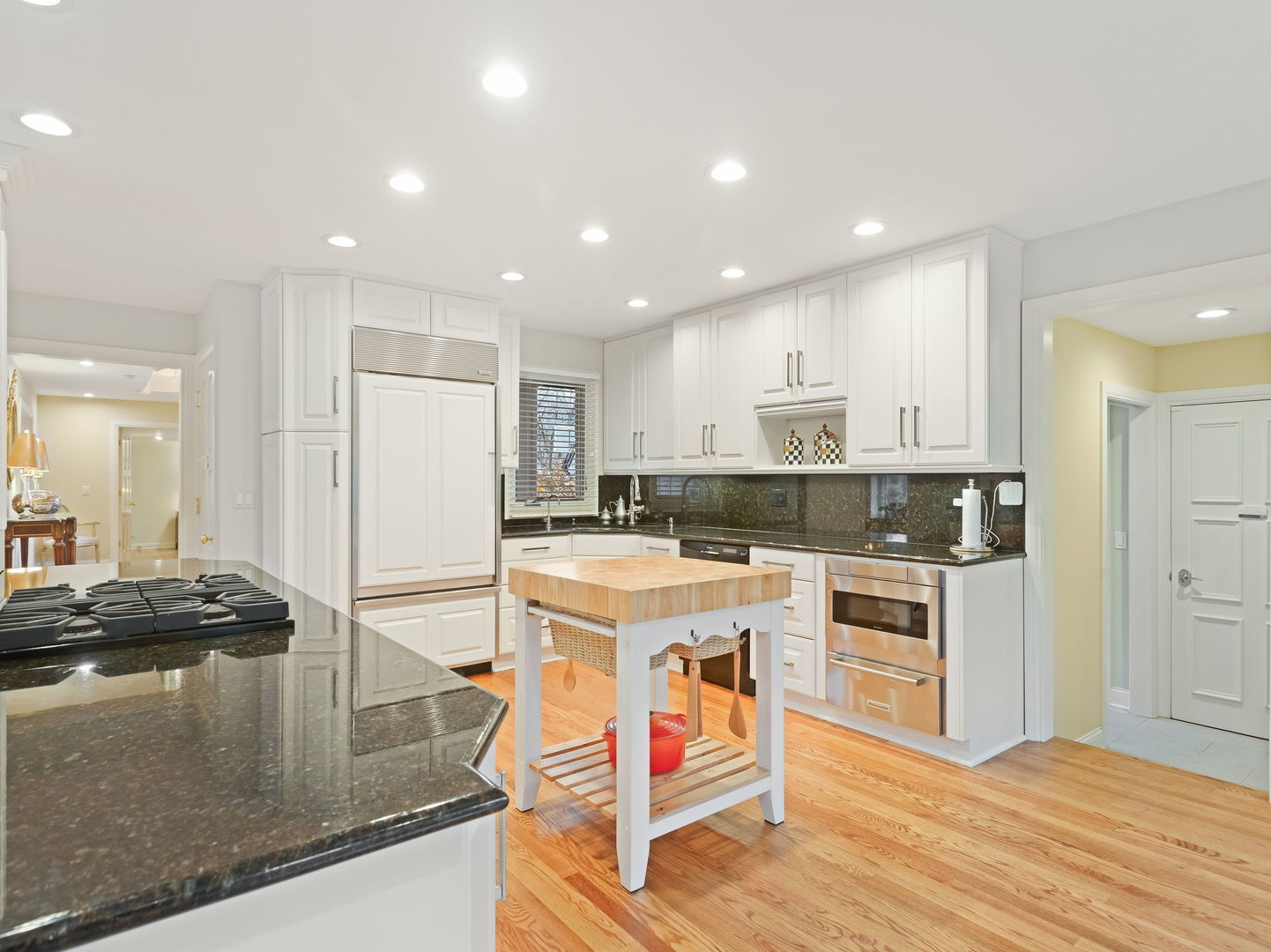 694 Buena Road Lake Forest, IL 60045 - Photo 13 of 39 a kitchen with kitchen island a stove a refrigerator and a stove
