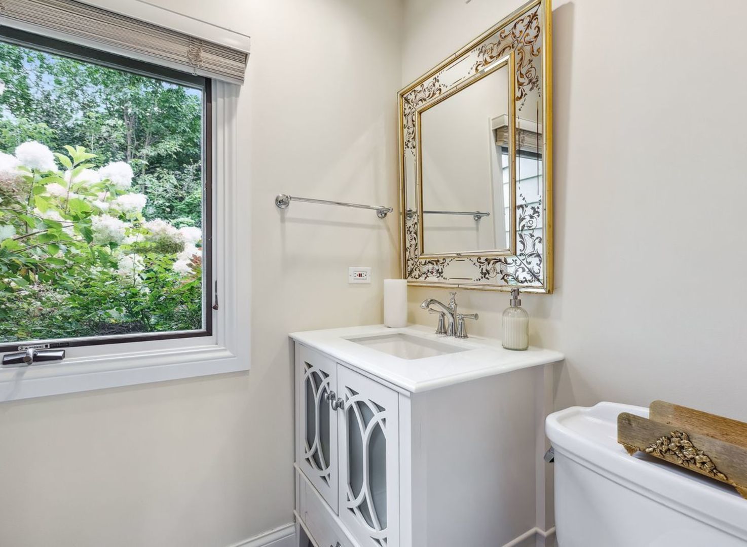 694 Buena Road Lake Forest, IL 60045 - Photo 20 of 39 a bathroom with a sink a toilet and a window
