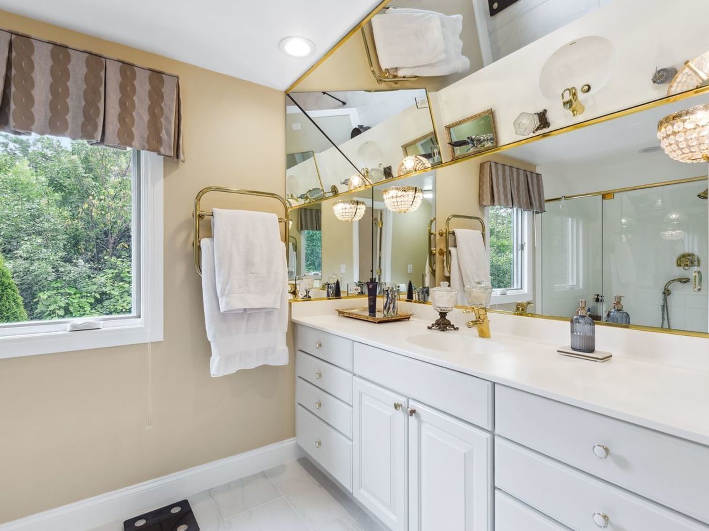 694 Buena Road Lake Forest, IL 60045 - Photo 22 of 39 a bathroom with a double vanity sink and a mirror