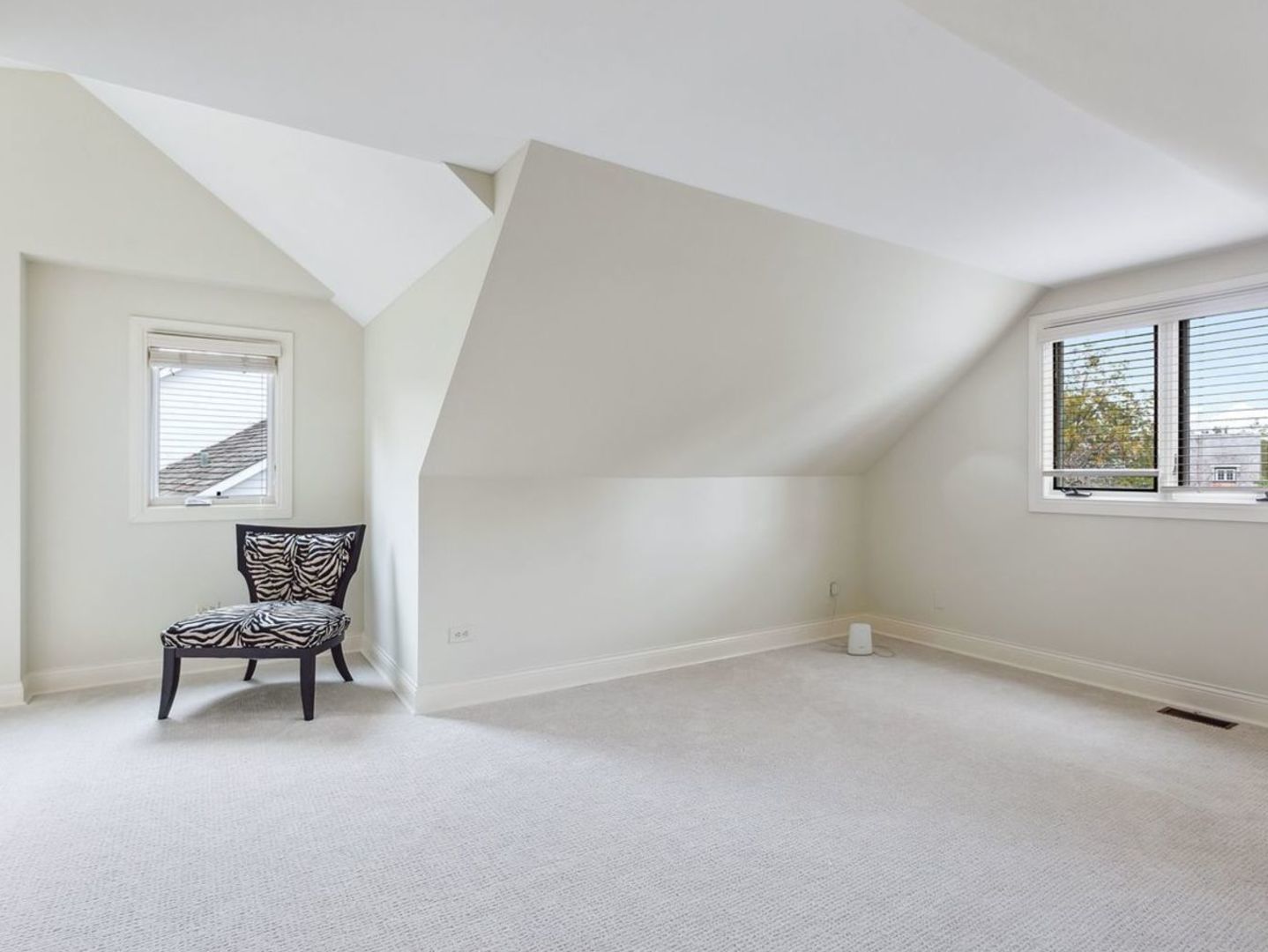 694 Buena Road Lake Forest, IL 60045 - Photo 28 of 39 a view of an empty room with window and stairs