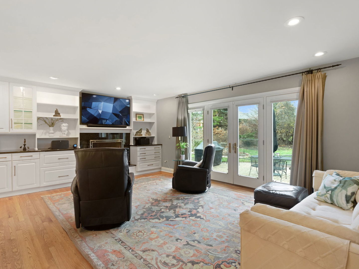694 Buena Road Lake Forest, IL 60045 - Photo 9 of 39 a living room with furniture and a flat screen tv