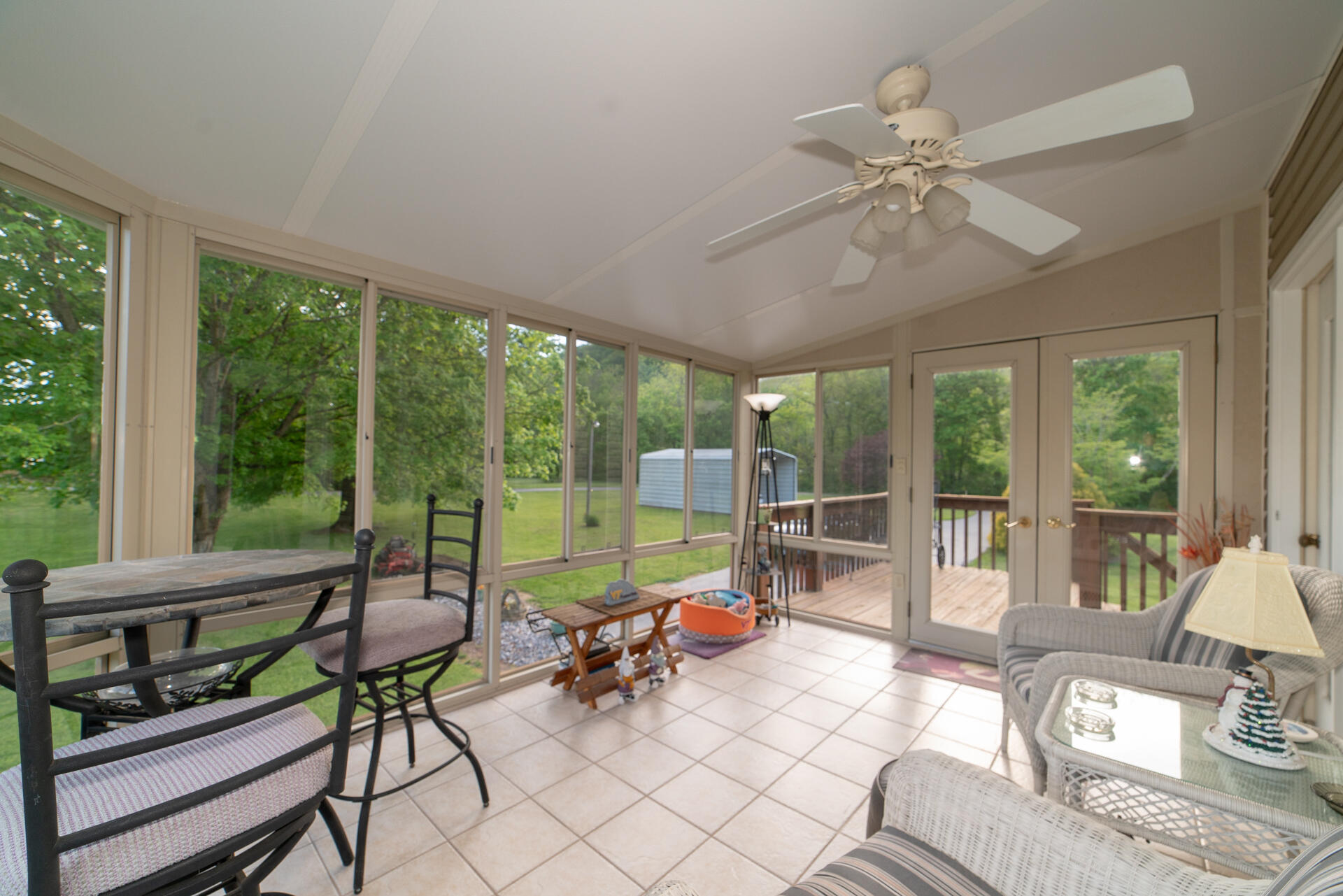 8796 Roanoke Road Elliston, VA 24087 - Photo 12 of 40 a living room with furniture and floor to ceiling windows