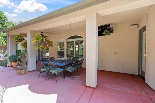 a garden view with a seating space