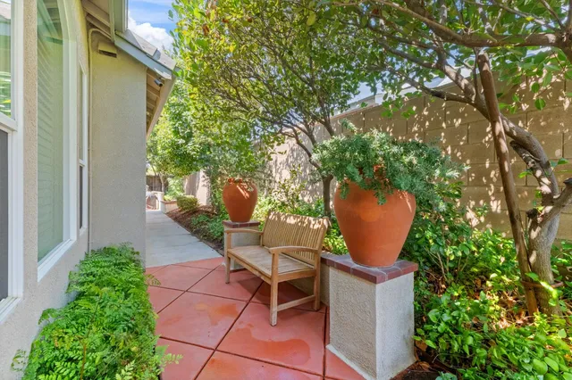 an aerial view of multiple houses with outdoor space