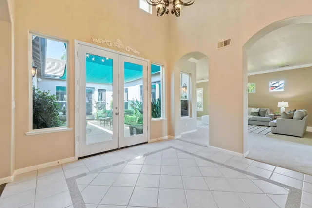a view of an entryway with livingroom