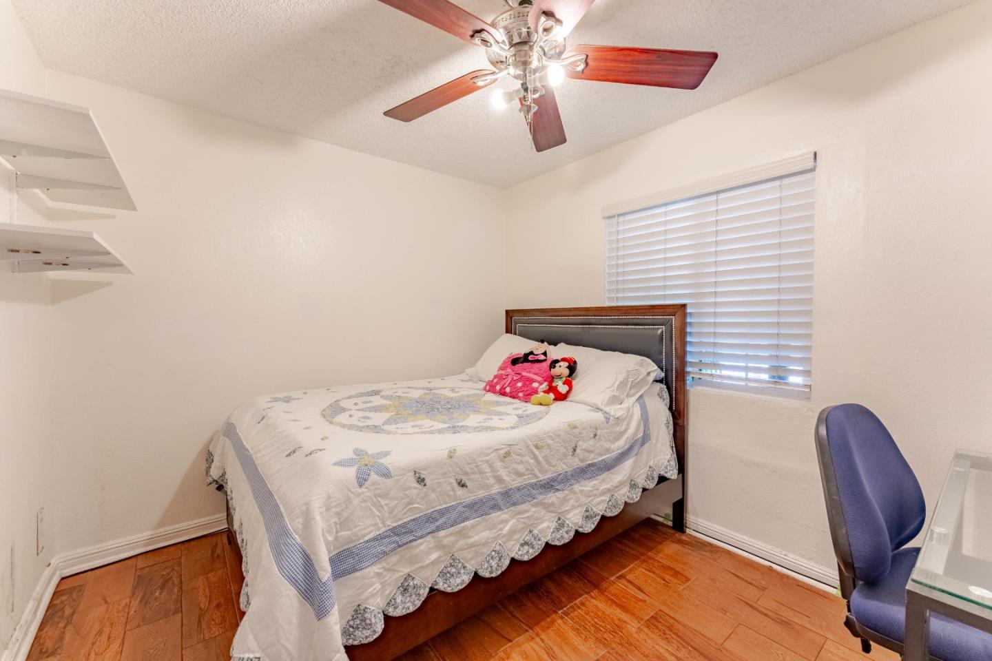 2776 Cramer Circle San Jose, CA 95111 - Photo 12 of 22 a bedroom with a bed and a chair