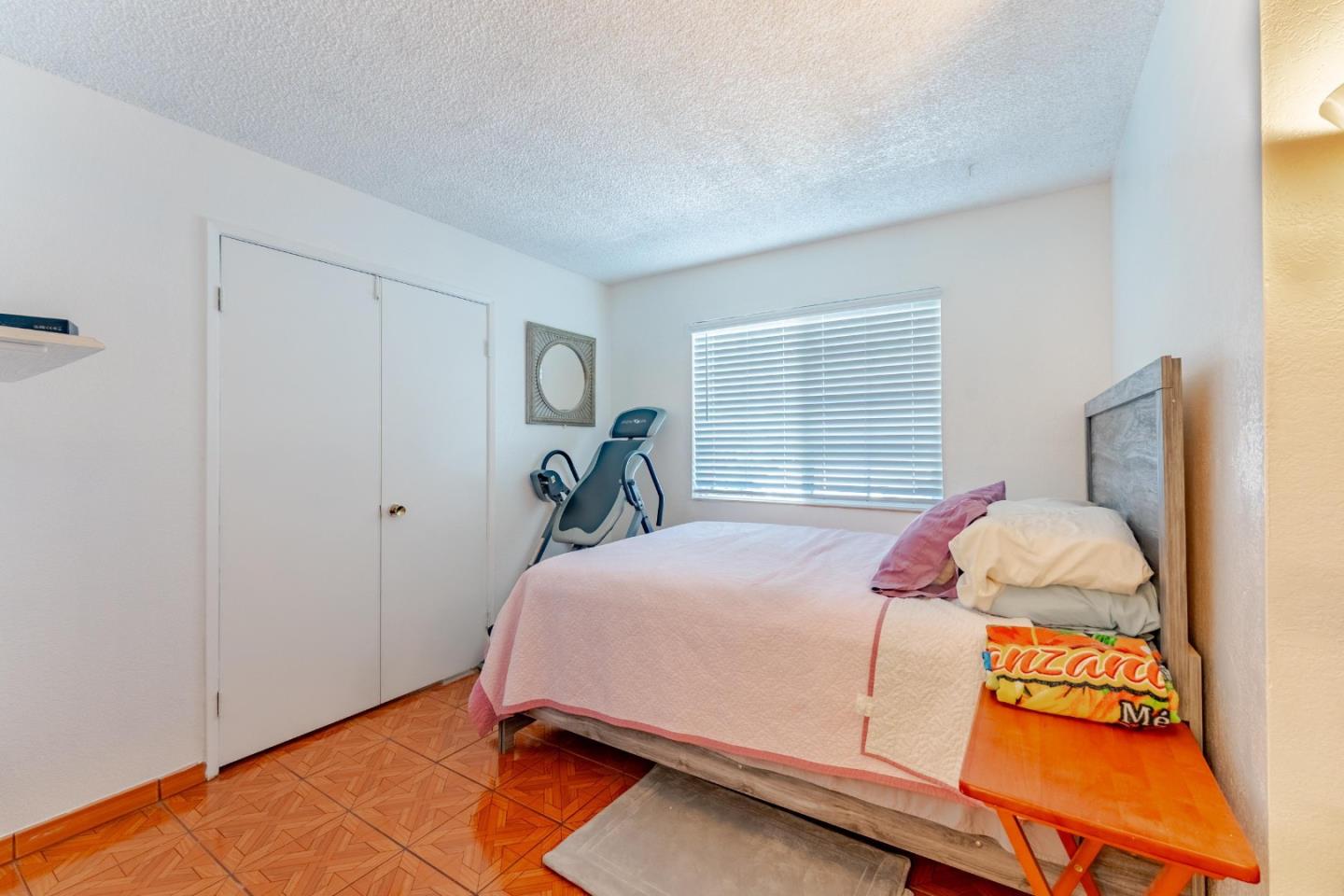 2776 Cramer Circle San Jose, CA 95111 - Photo 13 of 22 a bed room with a bed and a window