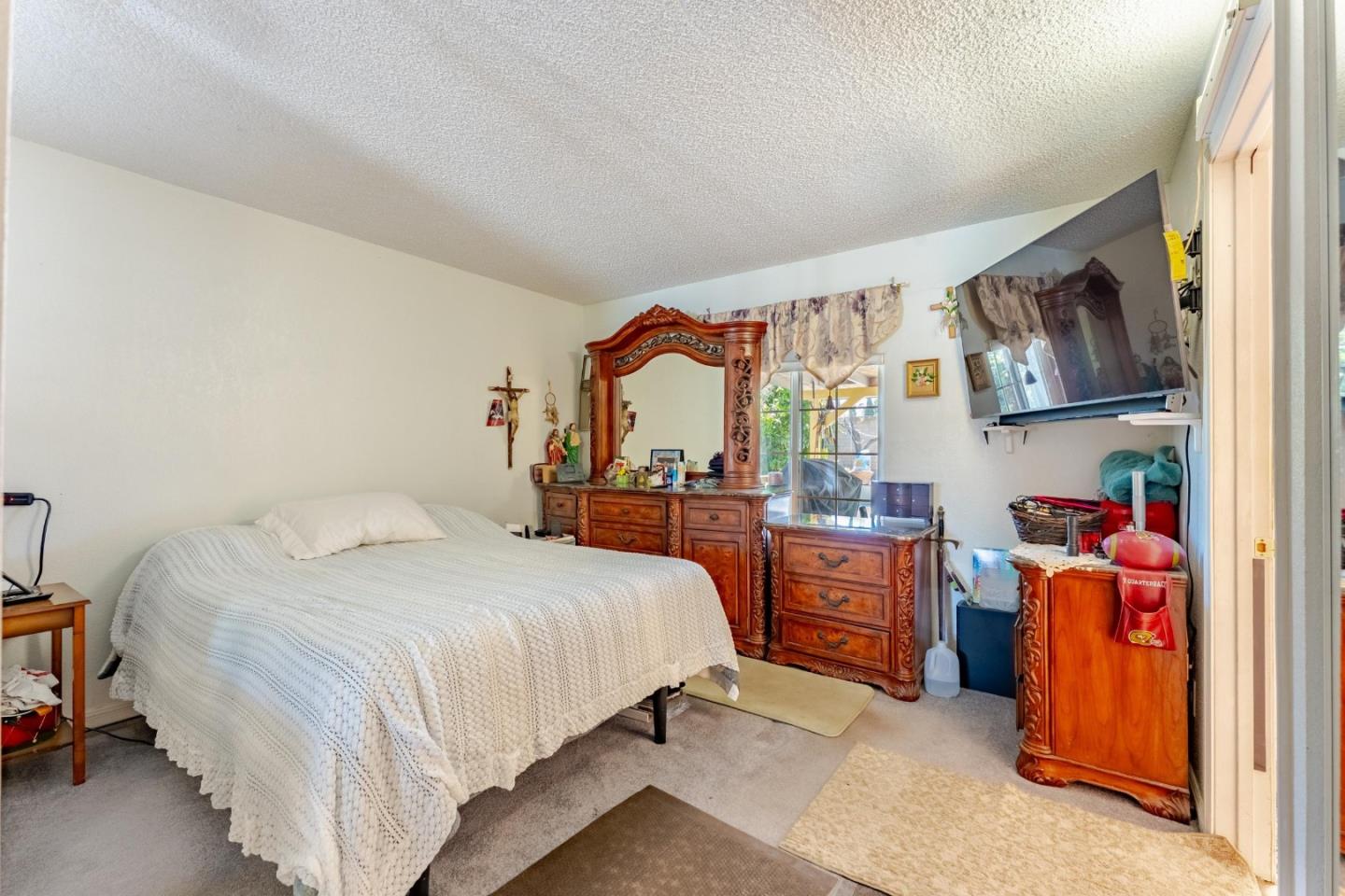 2776 Cramer Circle San Jose, CA 95111 - Photo 16 of 22 a bedroom with a bed and dresser