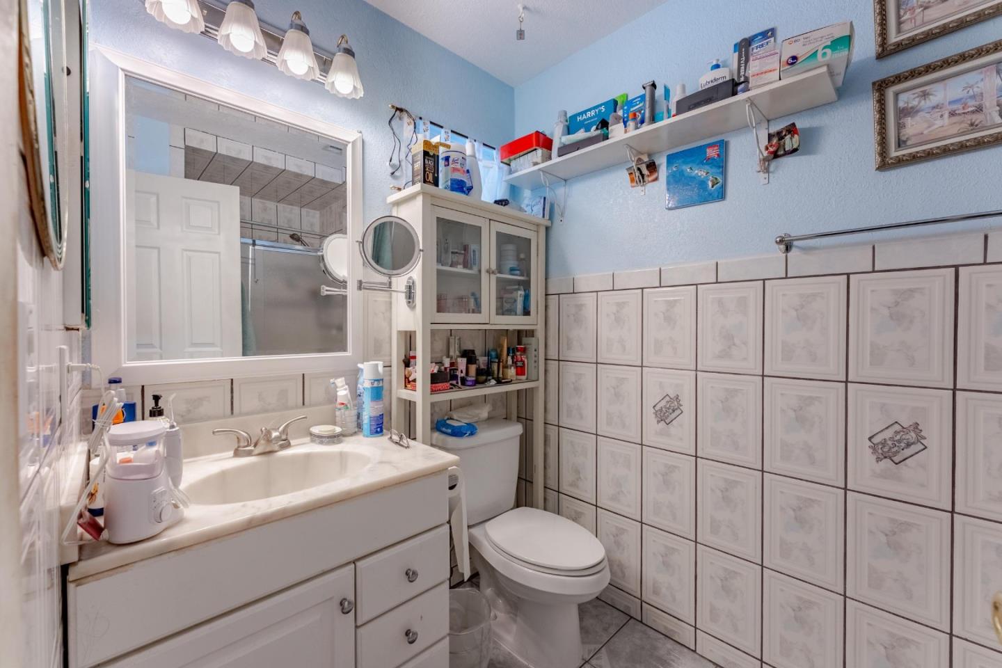 2776 Cramer Circle San Jose, CA 95111 - Photo 18 of 22 a bathroom with a sink toilet and shower