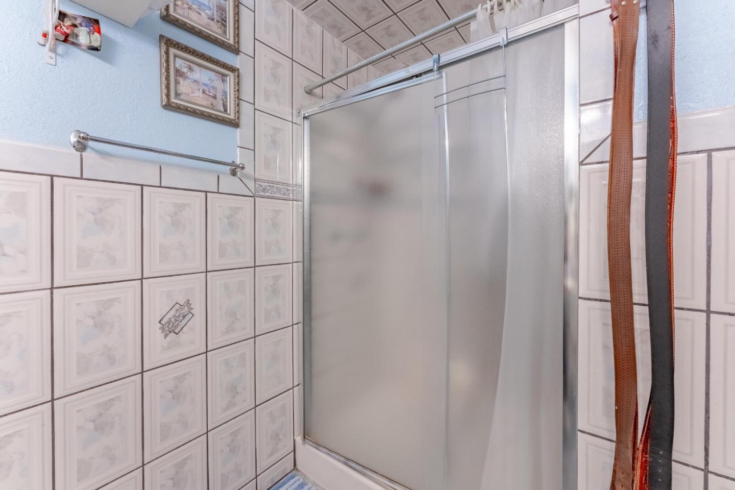 2776 Cramer Circle San Jose, CA 95111 - Photo 19 of 22 a bathroom with a shower