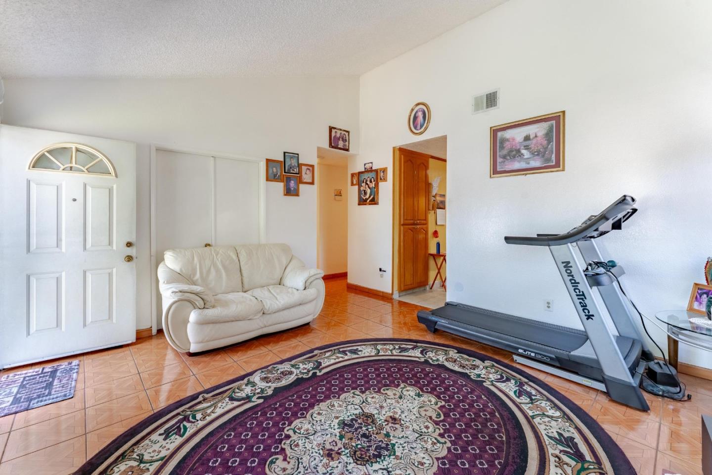 2776 Cramer Circle San Jose, CA 95111 - Photo 5 of 22 a living room with furniture and a rug