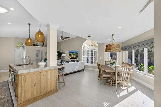 a view of kitchen with dining table and chairs