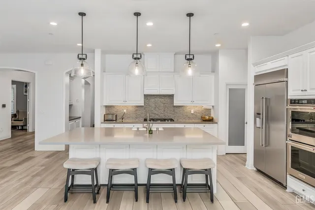 a bedroom with a bed and a table in it