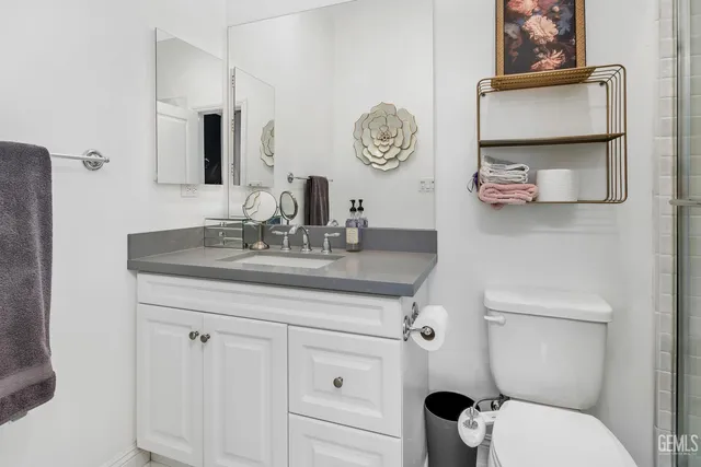 a view of an swimming pool with a yard and large trees