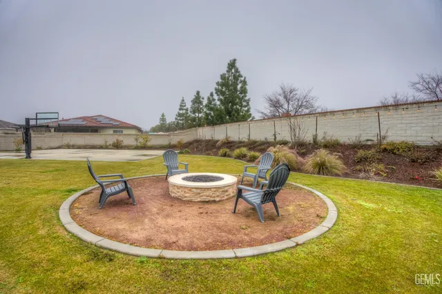 an aerial view of a house with a swimming pool