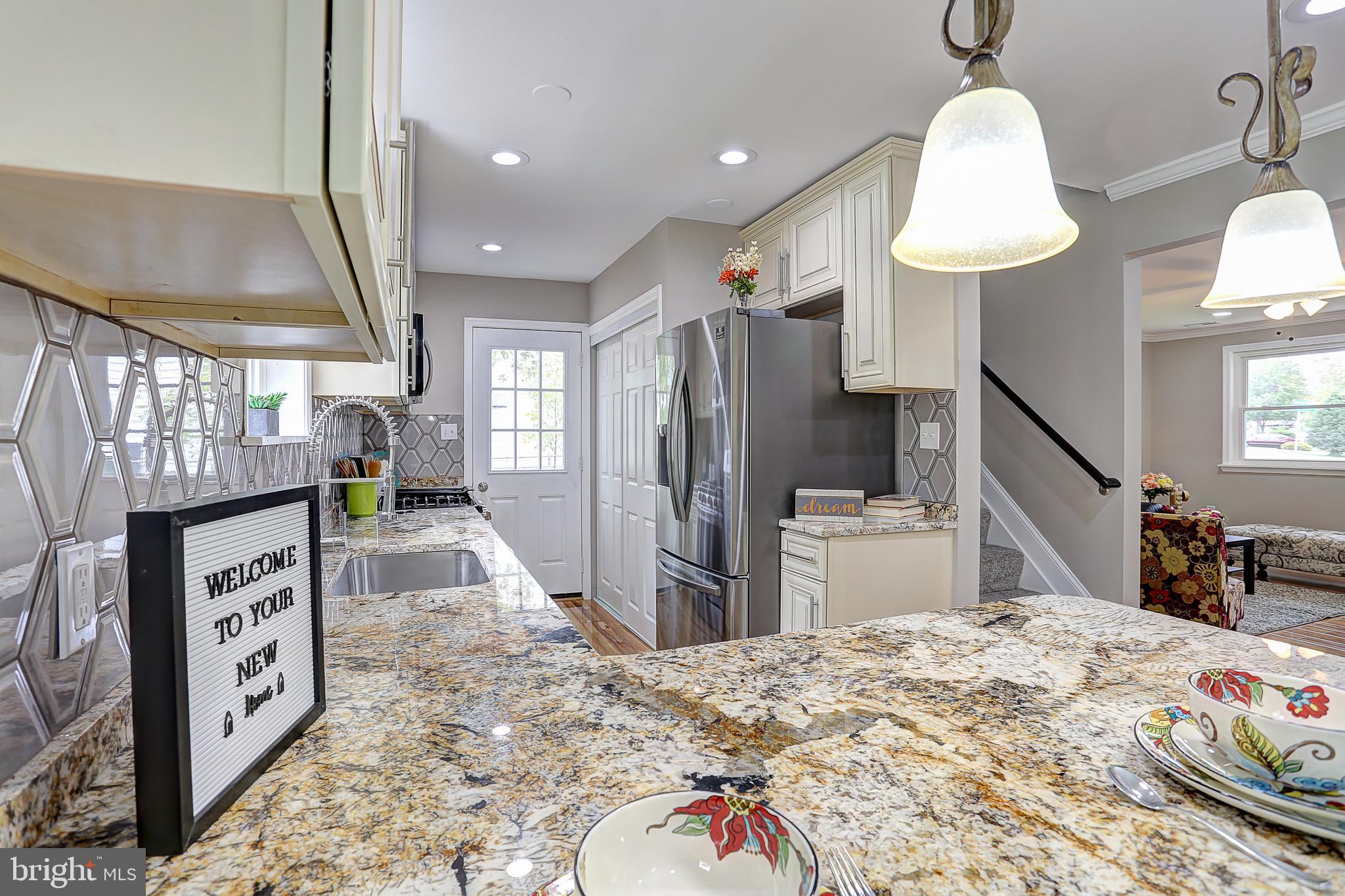 8831 Winterbrook Road Randallstown, MD 21133 - Photo 11 of 42 Exotic granite in Kitchen