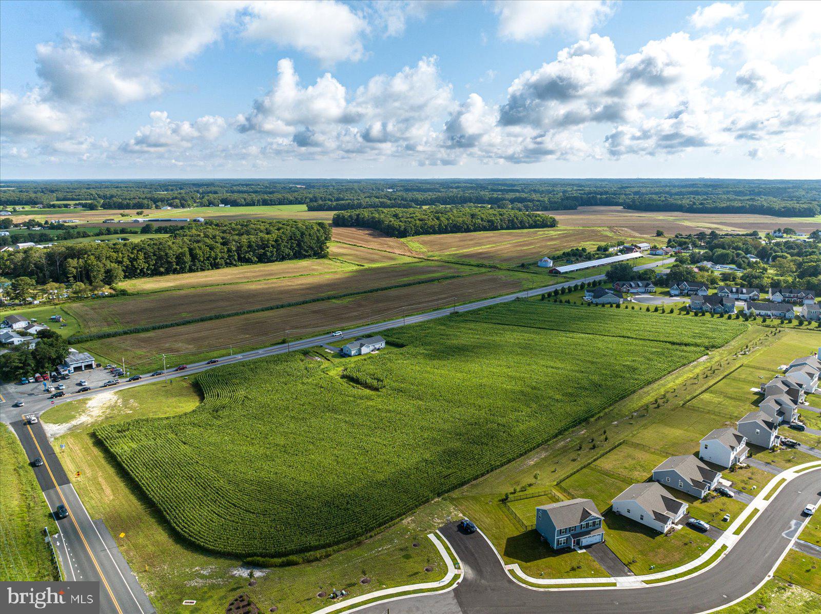 32474 Lighthouse Road Selbyville, DE 19975 - Photo 24 of 26 a view of a swimming pool with an outdoor seating