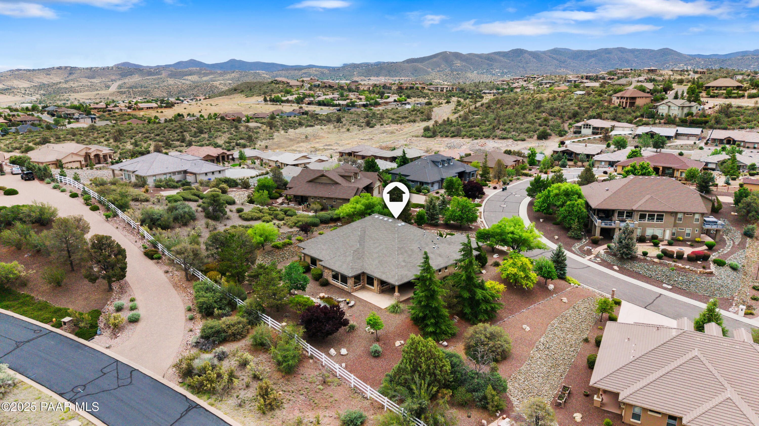 2117 Colter Bay Court Prescott, AZ 86301 - Photo 45 of 45 an aerial view of a city with lots of residential buildings and mountain view in back