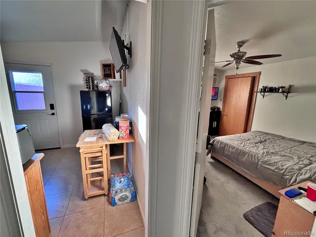 a kitchen with a sink appliances and cabinets