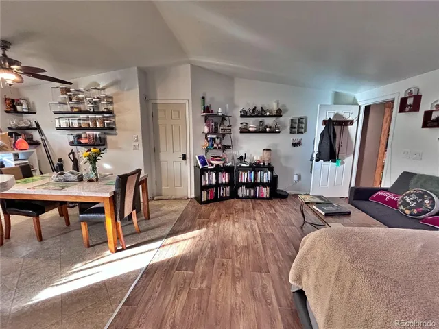 a view of a workspace with furniture and toys