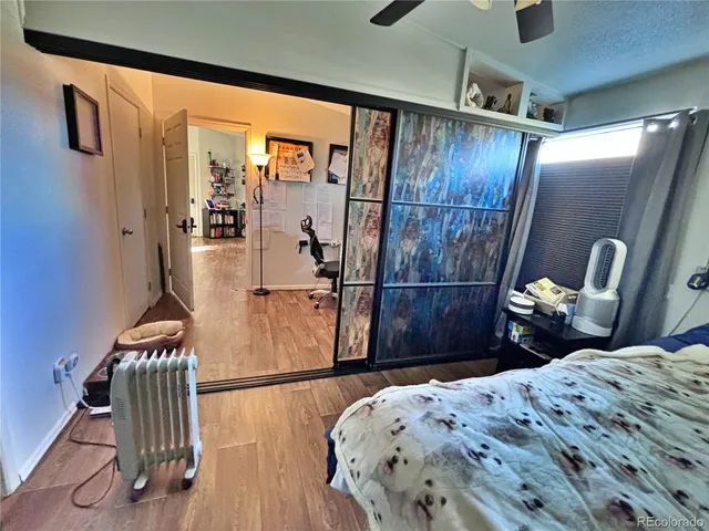 a bathroom with a sink a toilet and a shower