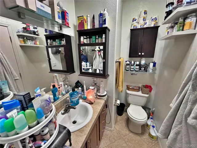 a view of swimming pool with seating area