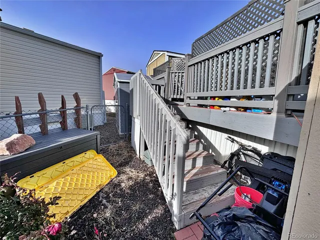 a backyard of a house with seating space