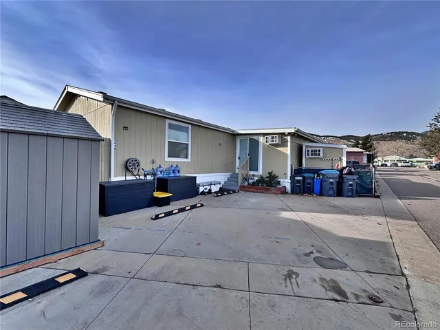 a front view of a house with stairs