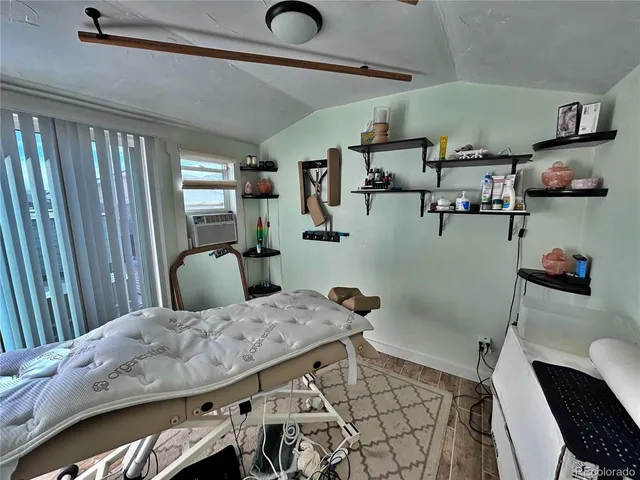 a front view of a house with a swing