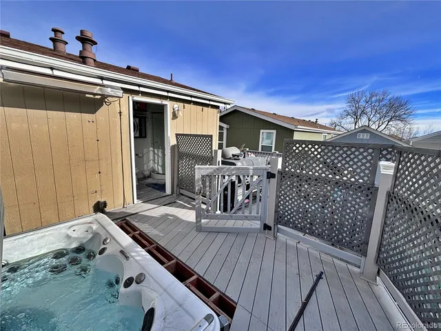 a view of balcony with furniture