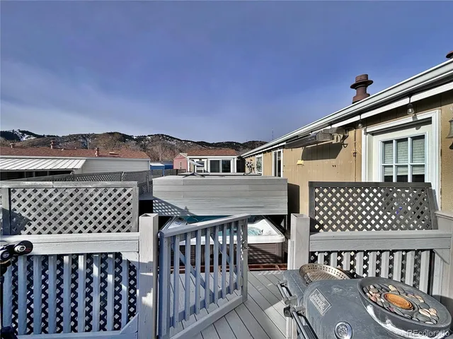 a front view of a house with outdoor seating