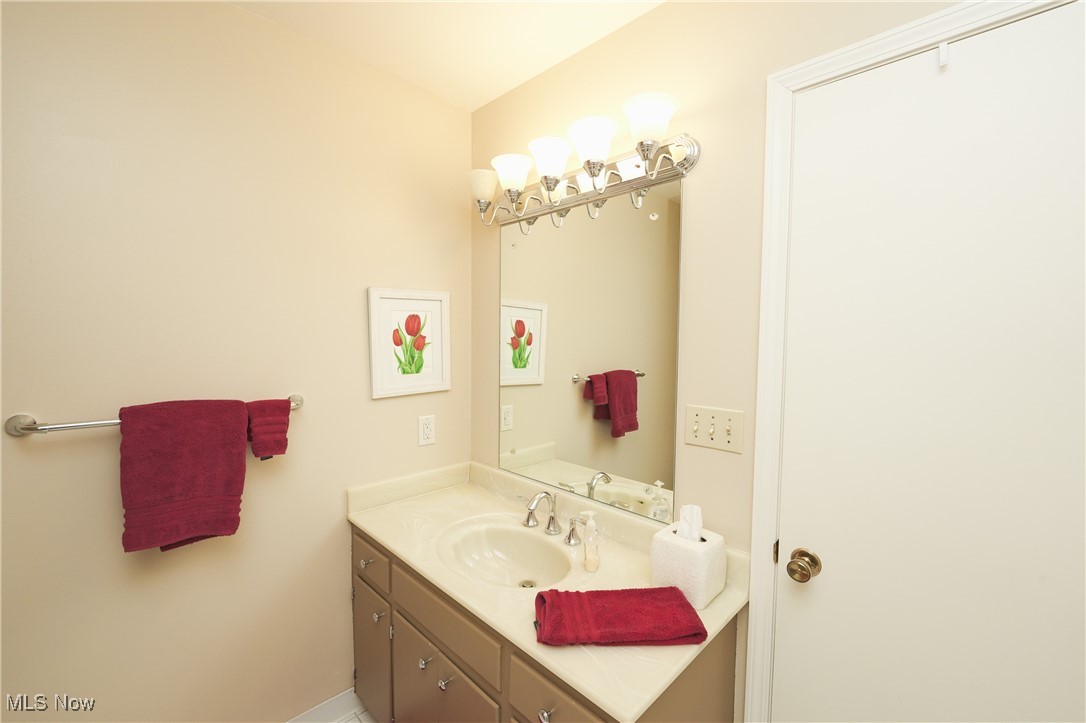 817 Rickel Circle Akron, OH 44333 - Photo 24 of 49 Bathroom with vanity and baseboards
