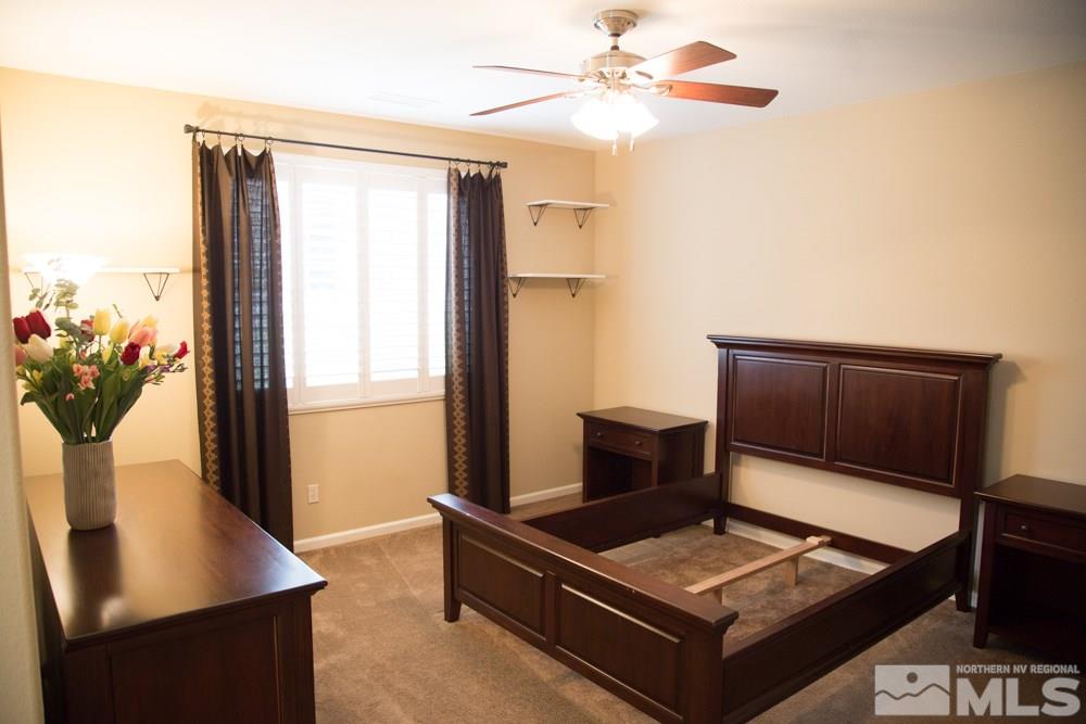 11061 Colton Drive Reno, NV 89521 - Photo 14 of 24 a living room with furniture and wooden floor