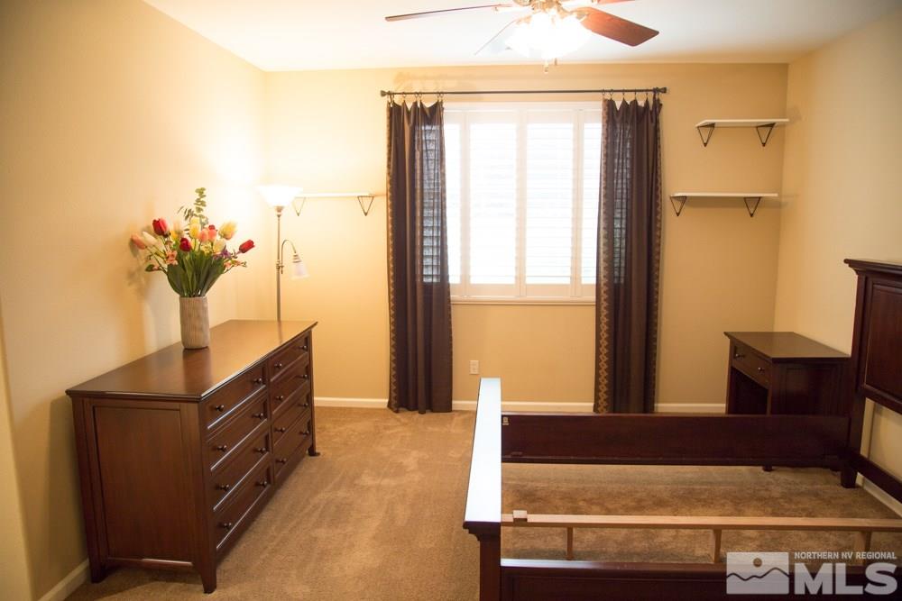 11061 Colton Drive Reno, NV 89521 - Photo 15 of 24 a view of kitchen with furniture and a potted plant