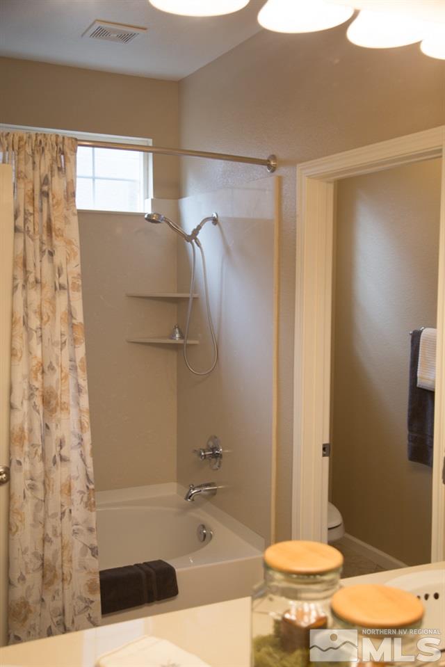 11061 Colton Drive Reno, NV 89521 - Photo 20 of 24 a bathroom with a sink and a toilet