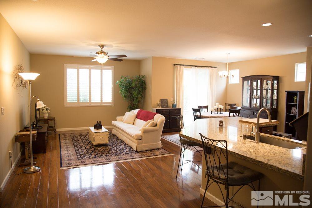 11061 Colton Drive Reno, NV 89521 - Photo 2 of 24 a living room with furniture and a large window
