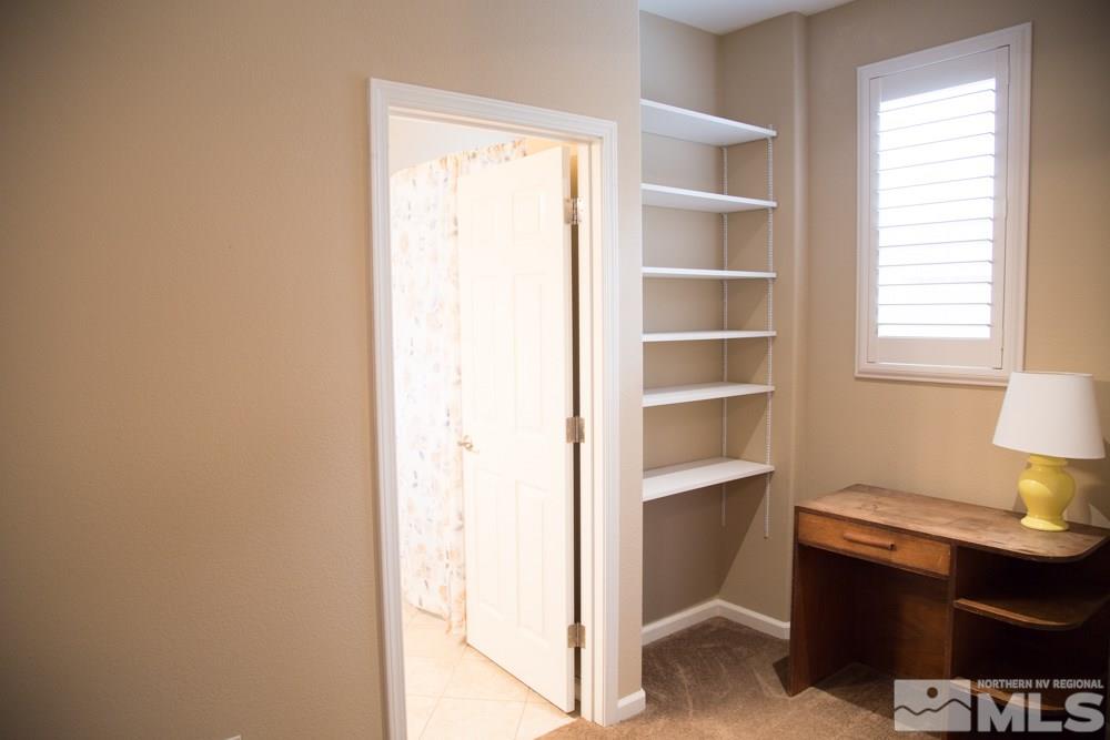 11061 Colton Drive Reno, NV 89521 - Photo 21 of 24 a room with cabinet and window