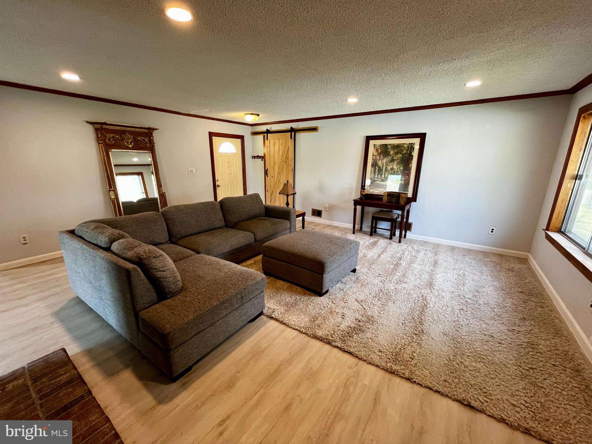1 Hornsby Drive Marlton, NJ 08053 - Photo 3 of 22 a living room with furniture and wooden floor