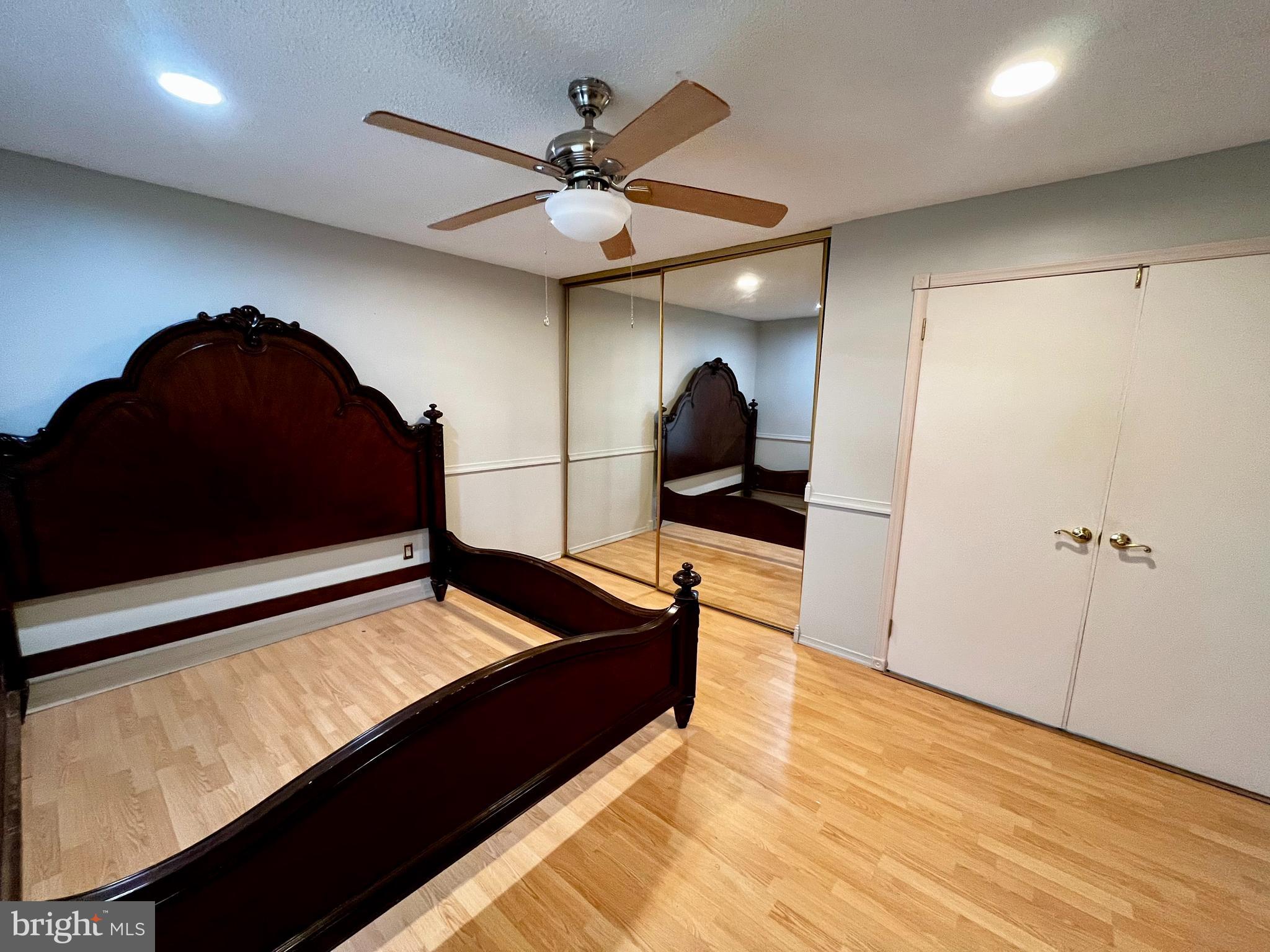 1 Hornsby Drive Marlton, NJ 08053 - Photo 10 of 22 a living room with a bed furniture and a wooden floor