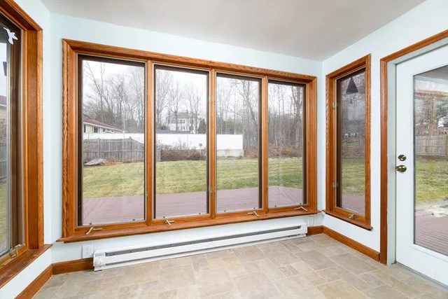 a view of an empty room and window