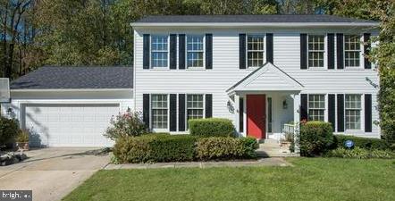 1404 Hunting Wood Road Annapolis, MD 21403 - Photo 1 of 15 front view of a house and a yard